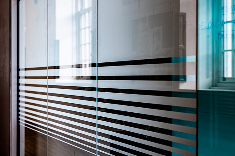 A striped window film made from PVC-free base materials.